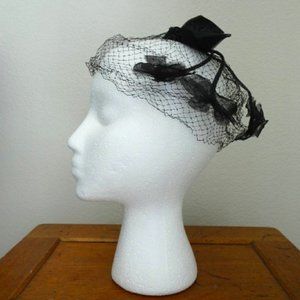 Black net 1950s fascinator veil with bow and flowers